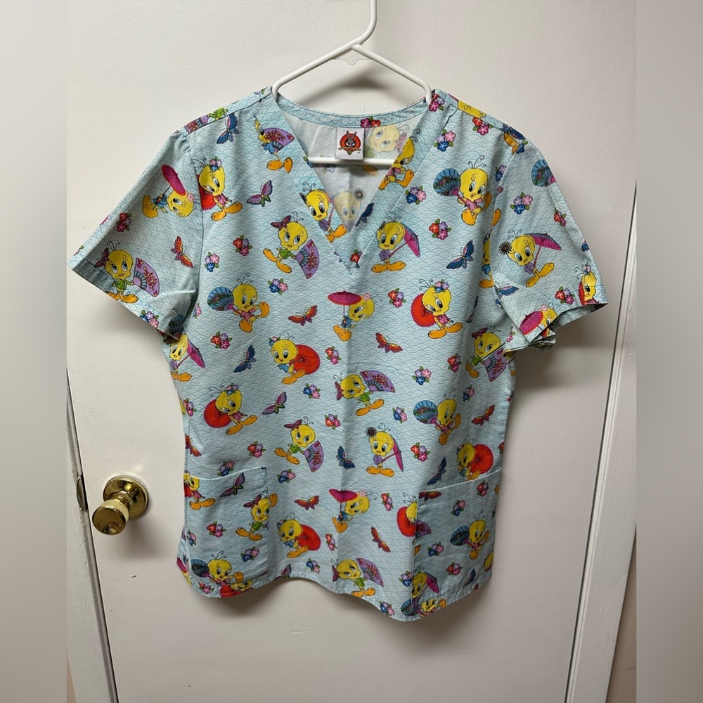 Women’s scrub top, excellent condition.